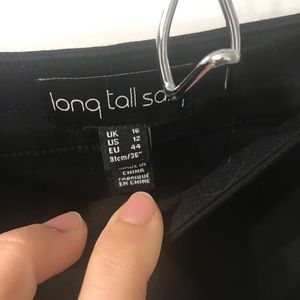 Black straight leg side zip trousers